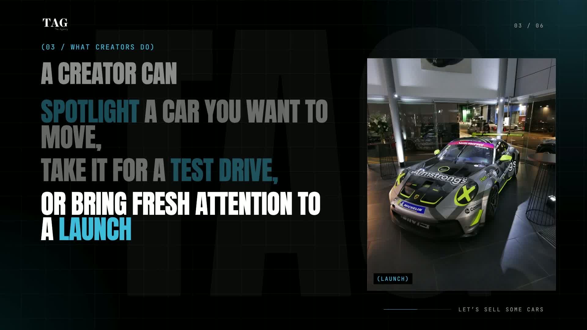 A race car on display in a dealership showroom at a TAG launch event