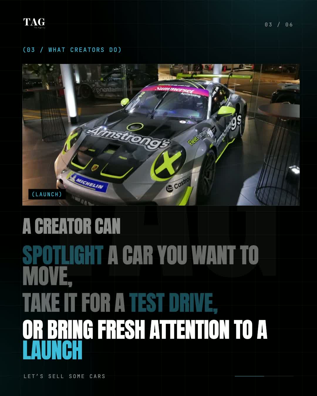 A race car on display at a dealership launch night